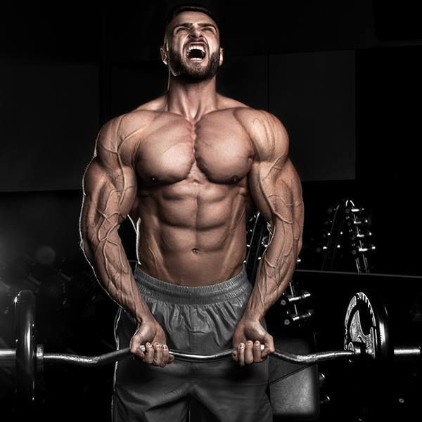 Man performing compound exercises as part of a full-body workout